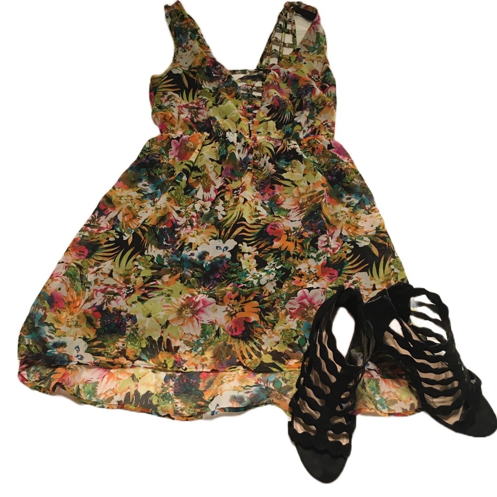 Multi color flower dress with back out. Size Medium. Great condition